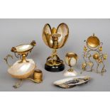 A collection of various shell mounted ormolu and white metal mounted ornaments
Together with an