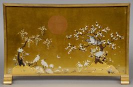 A late 19th/early 20th century gilt bronze framed shibayama panel
Decorated with cranes and an eagle