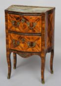 A 19th century French marble topped commode
Of small proportions, of bombe shape with grey inset