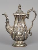 A George III silver coffee pot, hallmarked Sheffield 1827, maker's mark of IW
With embossed