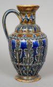 GEORGE TIINWORTH (1843-1913) British, for Doulton Lambeth
A 19th century pottery jug
Typically