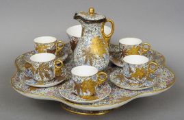 A Royal Worcester porcelain afternoon coffee set, including original Lazy Susan
Each piece decorated