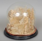 A Victorian diorama of dried flowers
Housed under a glass dome with an ebonised plinth base.   27