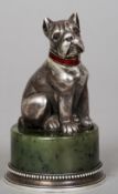 A Russian silver model of a pug dog
With gem set eyes and a guilloche enamel decorated collar,