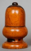 A late 18th century lignum vitae string box
Of acorn form, with a knopped finial.  20 cm high.