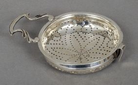 A George III silver single handled lemon strainer, possibly hallmarked for London 1789
Of typical