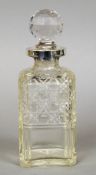 A Victorian silver mounted cut glass decanter, hallmarked London 1898, maker's mark indistinct
The