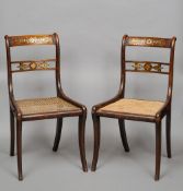 A set of four Regency brass inlaid rosewood and faux rosewood dining chairs
Each with a brass inlaid