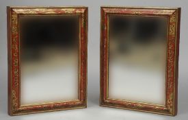 A pair of chinoiserie lacquered mirrors
Each cushion moulded frame with gilt decoration on a red