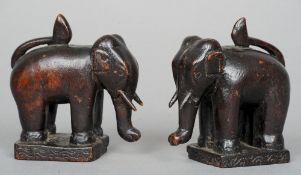 A pair of small 19th century Anglo-Indian carved models of elephants
Each modelled on all fours,