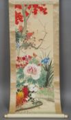 Two Chinese scroll painting
Each depicting birds amongst colourfully blossoming trees, one with