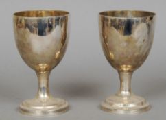 A pair of George III silver goblets, each hallmarked London 1789, maker's mark of TH
Of typical