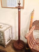 A late 19th/early 20th century oak snooker cue stand 
Of typical circular form, mounted with various