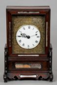 A late 19th century Chinese carved hardwood cased mantel clock
The mirror panelled case enclosing