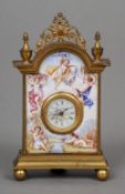 A Swiss miniature enamel decorated gilt bronze desk clock
Of domed form with a pierced spandrel, the