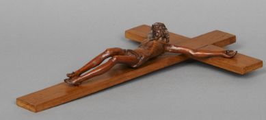 An 18th century carved fruitwood Corpus Christi figure
Typically modelled mounted to a later cross.