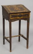 A 19th century grained and painted pine clerks desk
The hinged sloped top enclosing a recess,