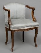 A 19th century beechwood framed upholstered open armchair
With acanthus carved arms and slender