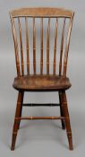 A 19th century inlaid mahogany stick back chair, in the American style
The marquetry inlaid top rail