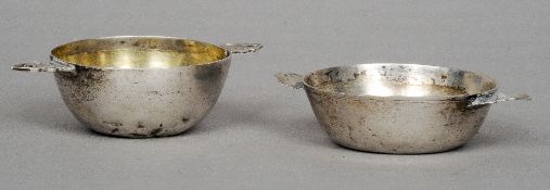 Two 17th century silver twin handled wine tasters
Each of typical twin handled form, one with