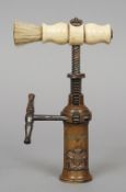 A Victorian King's pattern corkscrew
The turned barrel with Royal coat-of-arms, the bone handle with