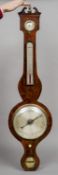 A 19th century rosewood cased banjo barometer
The brass urn centred broken swan-neck pediment