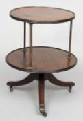 A 19th century mahogany two tier dumb waiter
Each tier of reed circular form separated by tubular