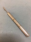 A silver double ended toothpick, hallmarked Birmingham 1964, maker's mark of S.J. Rose & Son
The