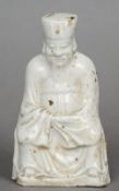 An antique Chinese blanc de chine model of a deity
The bearded figure seated in flowing robes.  14