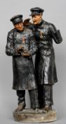 A late 19th century painted plaster figural group "The Whisperer"
Modelled as two war veterans,