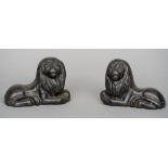A pair of 19th century cast iron models of lions
Each modelled recumbent.  Each 18 cm wide.  (2)