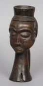 A Central African tribal carved wooden cup
The main body formed as a tribal bust, probably Luba