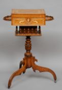 A 19th century Anglo-Indian ivory inlaid teak work table
The hinged rectangular top enclosing a