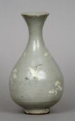 A 19th century Korean Choson Dynasty celadon glazed vase
Of baluster form with inlaid white slip