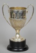 A Victorian silver twin handled trophy cup, hallmarked London 1890, maker's mark of Walter