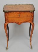 A 19th century marquetry inlaid walnut and kingwood side table
The three quarter pierced galleried