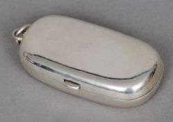 A Victorian silver double sovereign case, hallmarked Chester 1894
Of plain oval form with a