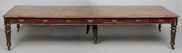 A large Victorian mahogany boardroom table
The leather inset moulded rectangular top above