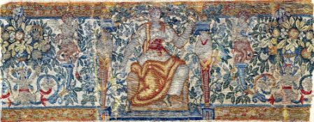 A 16th century English tapestry panel
Decorated with a classical scene with cherubs a seated courtly