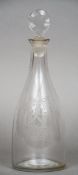 A 19th century engraved mallet form clear glass decanter
With two bow tied oval vignettes of various
