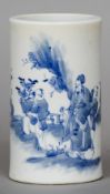 A small Chinese blue and white porcelain brush pot
Decorated with a courtly figure and attendants in