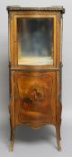 A Louis XV style Vernis Martin type vitrine
The three quarter brass galleried top above the glazed