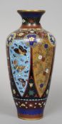 A late 19th/early 20th century Japanese cloisonne vase
Decorated with birds and butterflies and