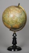 A late 19th/early 20th century terrestrial globe
Of typical form, standing on a turned ebonised