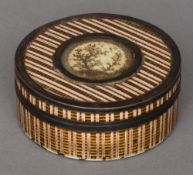 An 18th century French unmarked silver mounted lacquer decorated tortoiseshell snuff box
Of circular