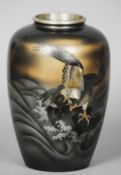 A Japanese patinated bronze vase
Of ovoid form, the front decorated with an eagle, the reverse