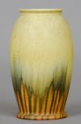 A Ruskin pottery baluster vase
With crystalline lustre glaze, impressed mark Ruskin, England and