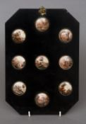 A set of nine 19th century Continental miniature scenic vignettes
Each of circular form painted with