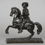 A 19th century patinated bronze model of a cavalier on horseback
Modelled in typical costume, his
