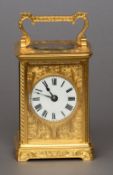 A 19th century French gilt brass striking carriage clock
The white enamel dial with Roman numerals